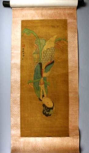 Schildering op textiel, met Oosterse voorstelling van een zittende dame die brief leest